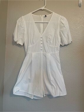 Puff Sleeve White V-Neck Romper with Button Front